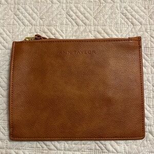 Ann Taylor tan leather clutch. NWOT